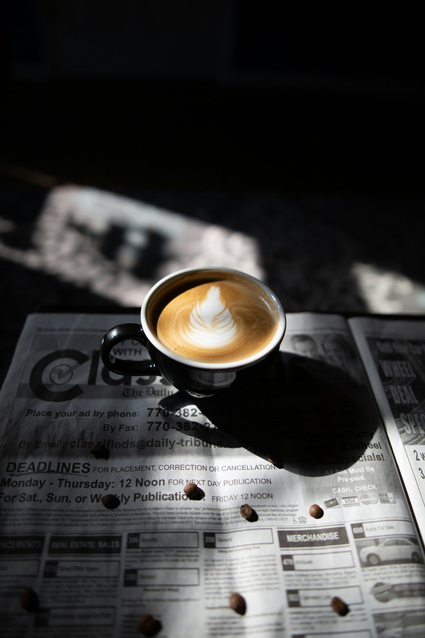 Latte art in a ceramic cup at Noir House